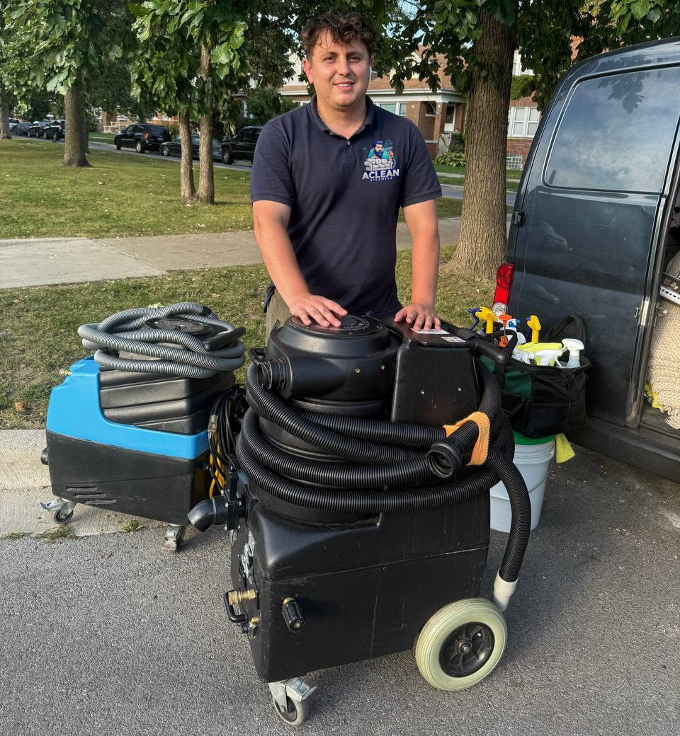 Aclean Steamers technician with professional commercial-grade extraction equipment