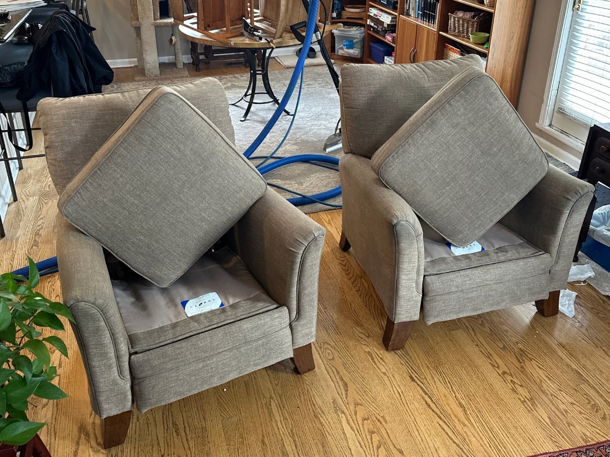 Aclean Steamers technician performing professional chair cleaning in a Charlotte, NC home