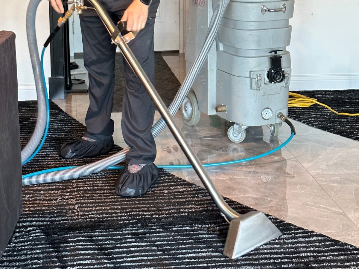 Aclean Steamers technician performing professional commercial cleaning in a Charlotte, NC business
