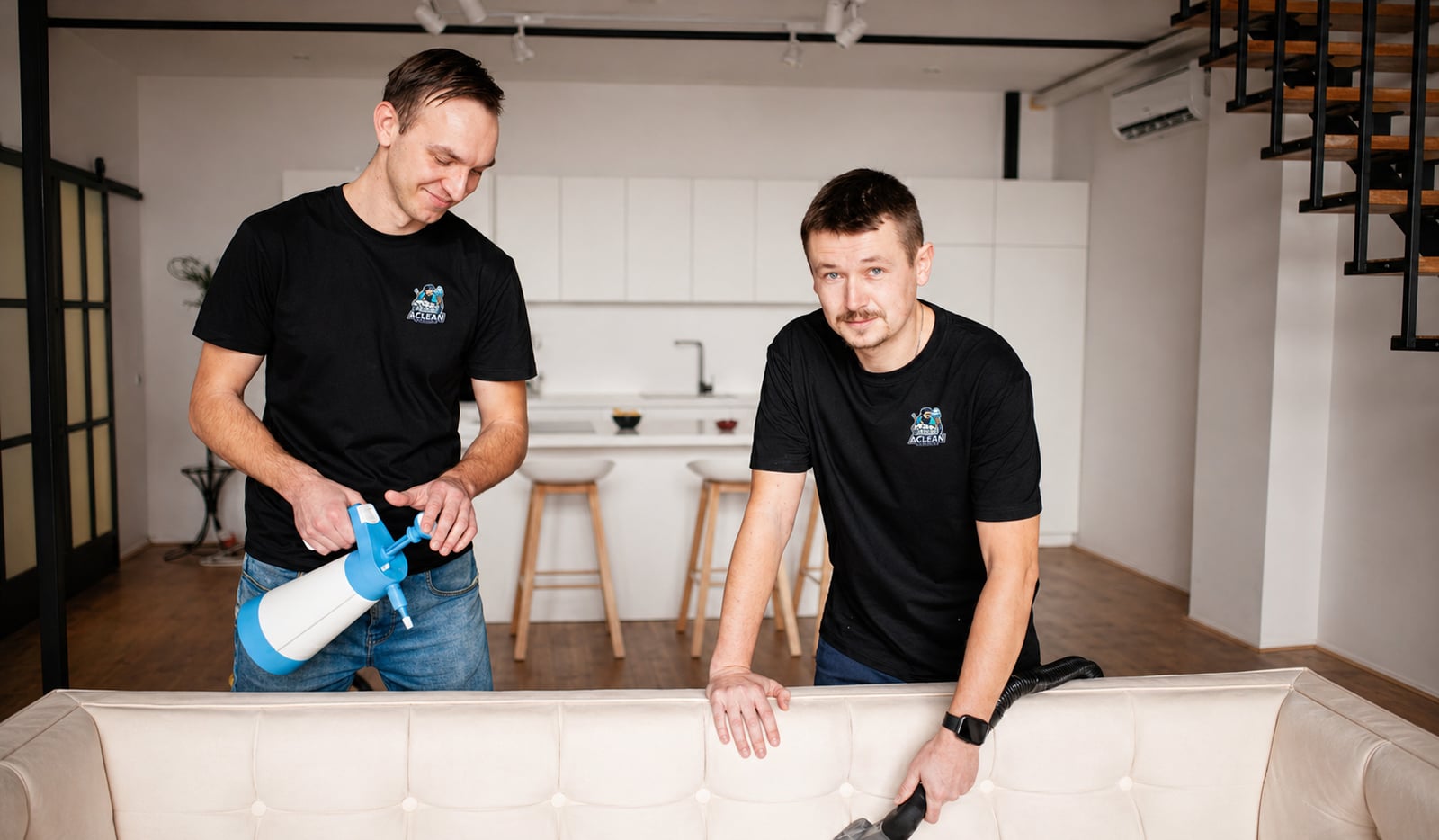 Aclean Steamers technicians providing professional upholstery cleaning service for a customer in Raleigh