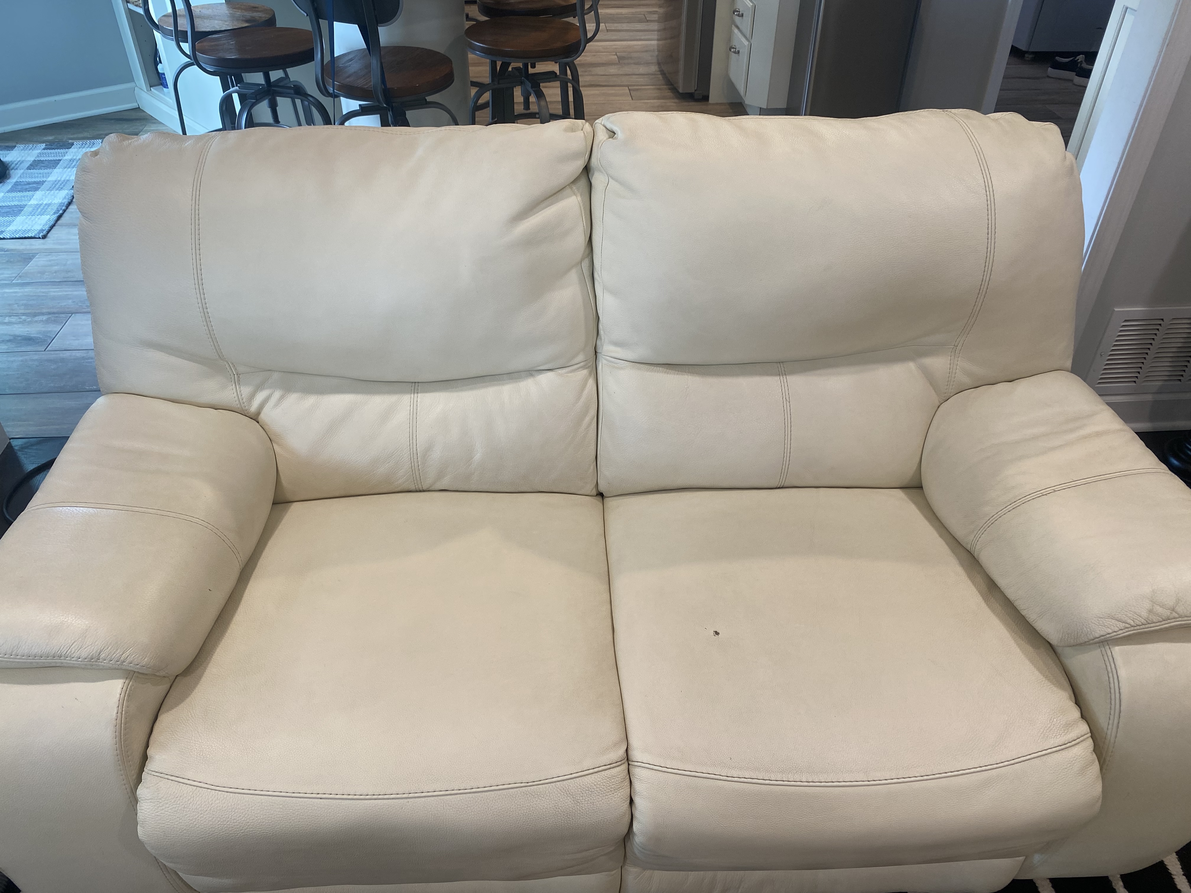 Charlotte leather chair refreshed after Aclean Steamers clean and condition service