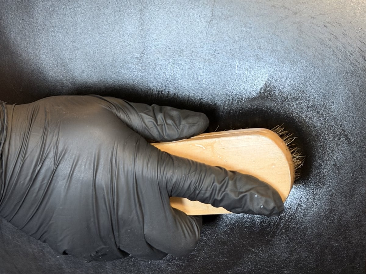 Leather cleaning in a Charlotte, NC home, leather couch deep-cleaned and protected